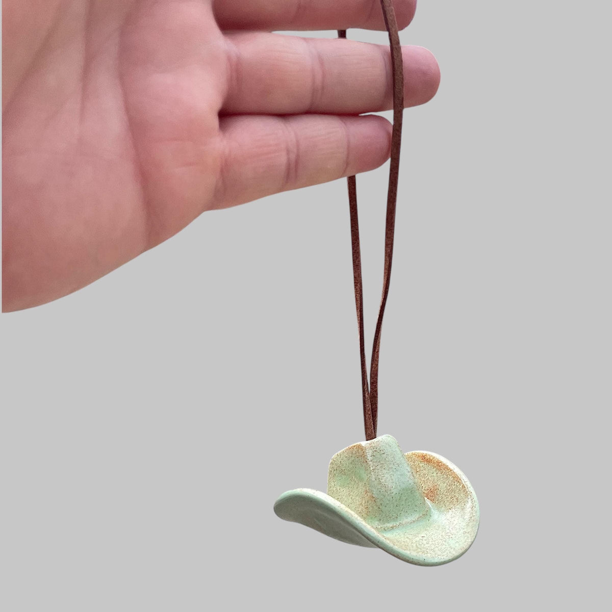 Small Ceramic Cowboy Hat Ornament with Vegan Leather Cord — Sage Green Glaze