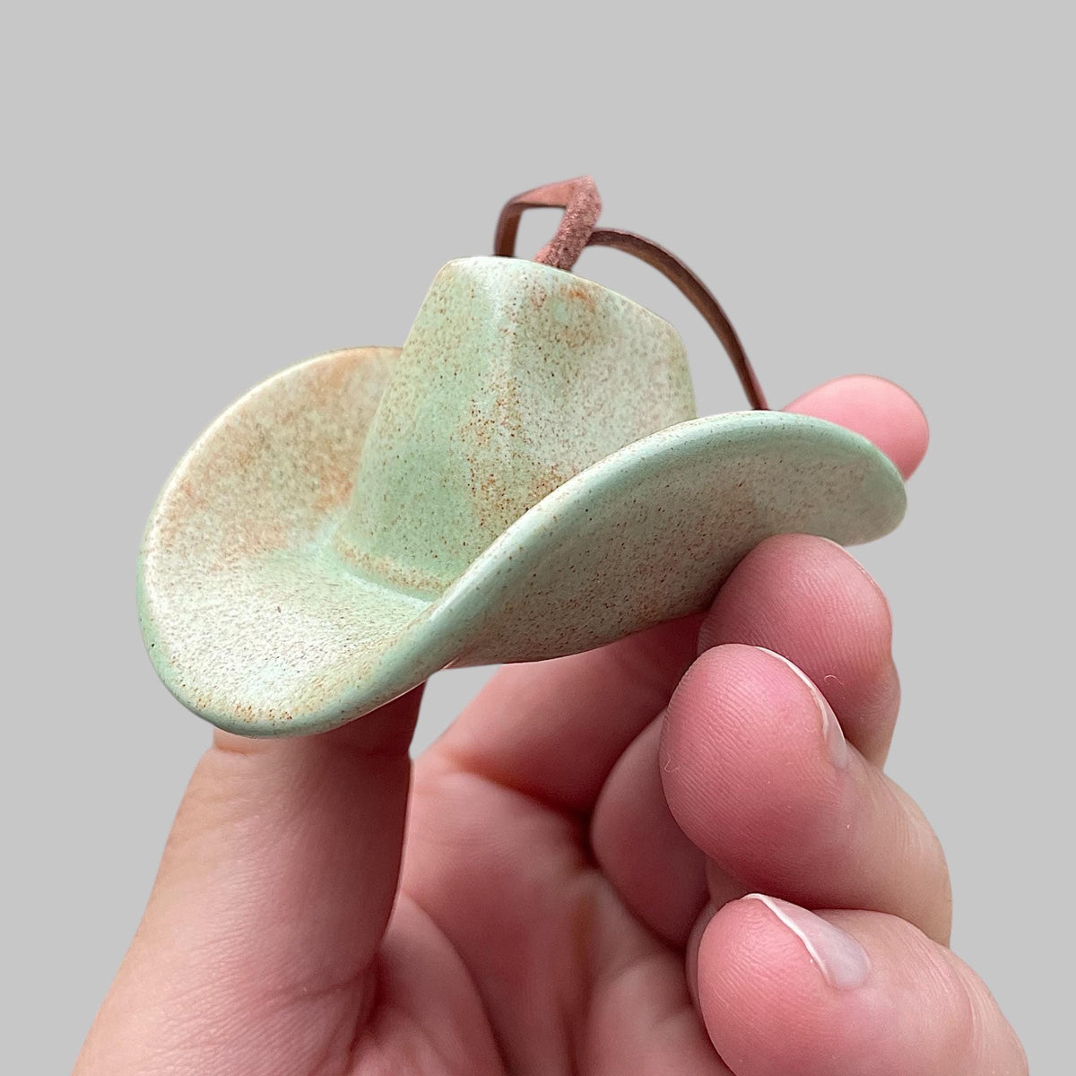 Small Ceramic Cowboy Hat Ornament with Vegan Leather Cord — Sage Green Glaze